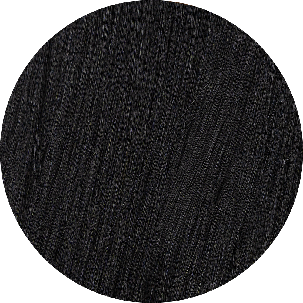 A close-up image of  black clip-in hair extensions showcasing the texture and color of the hair.