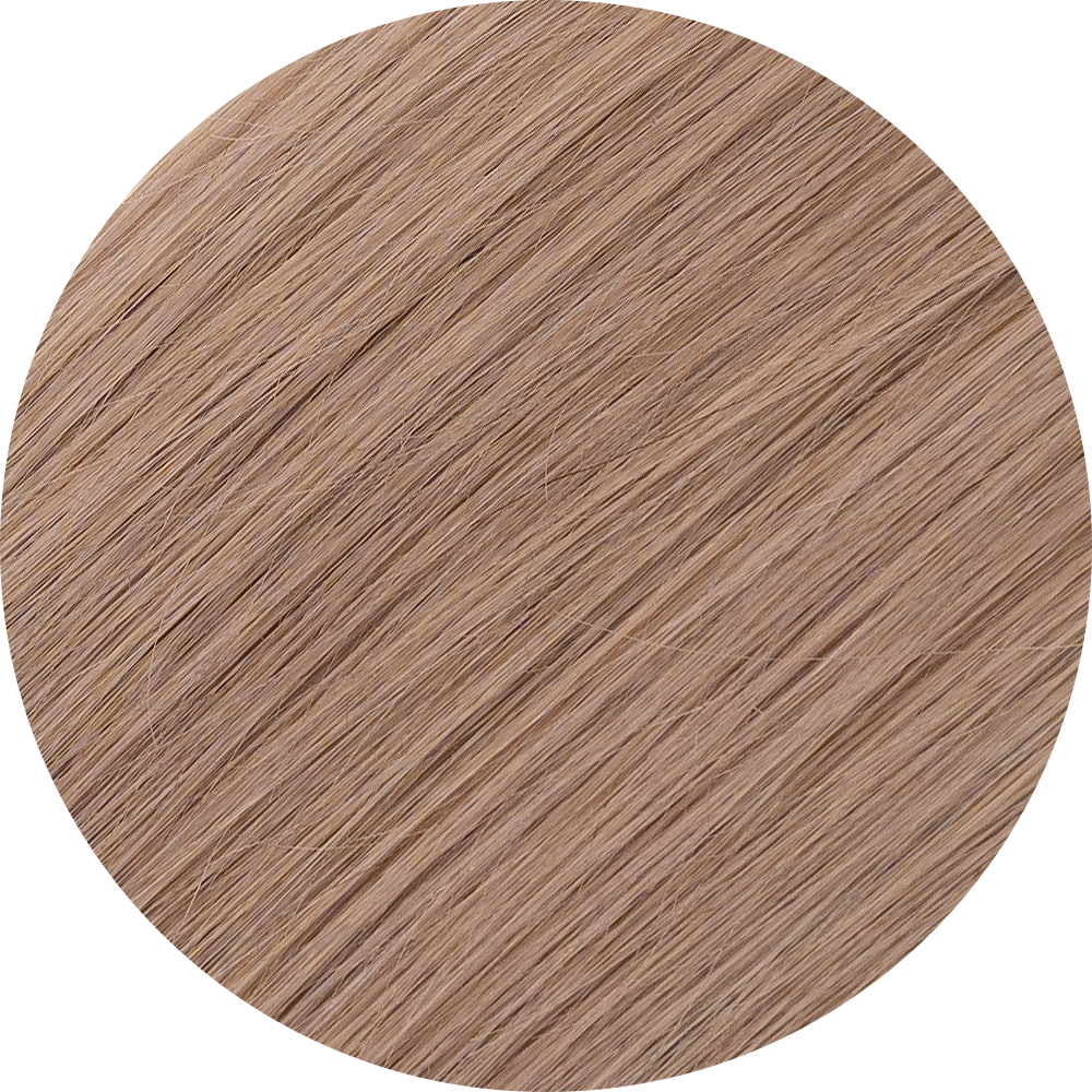 A close-up image of beige clip-in hair extensions showcasing the texture and color of the hair.