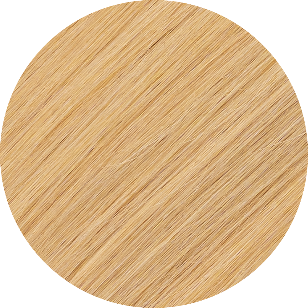 A close-up image of medium blonde clip-in hair extensions showcasing the texture and color of the hair.