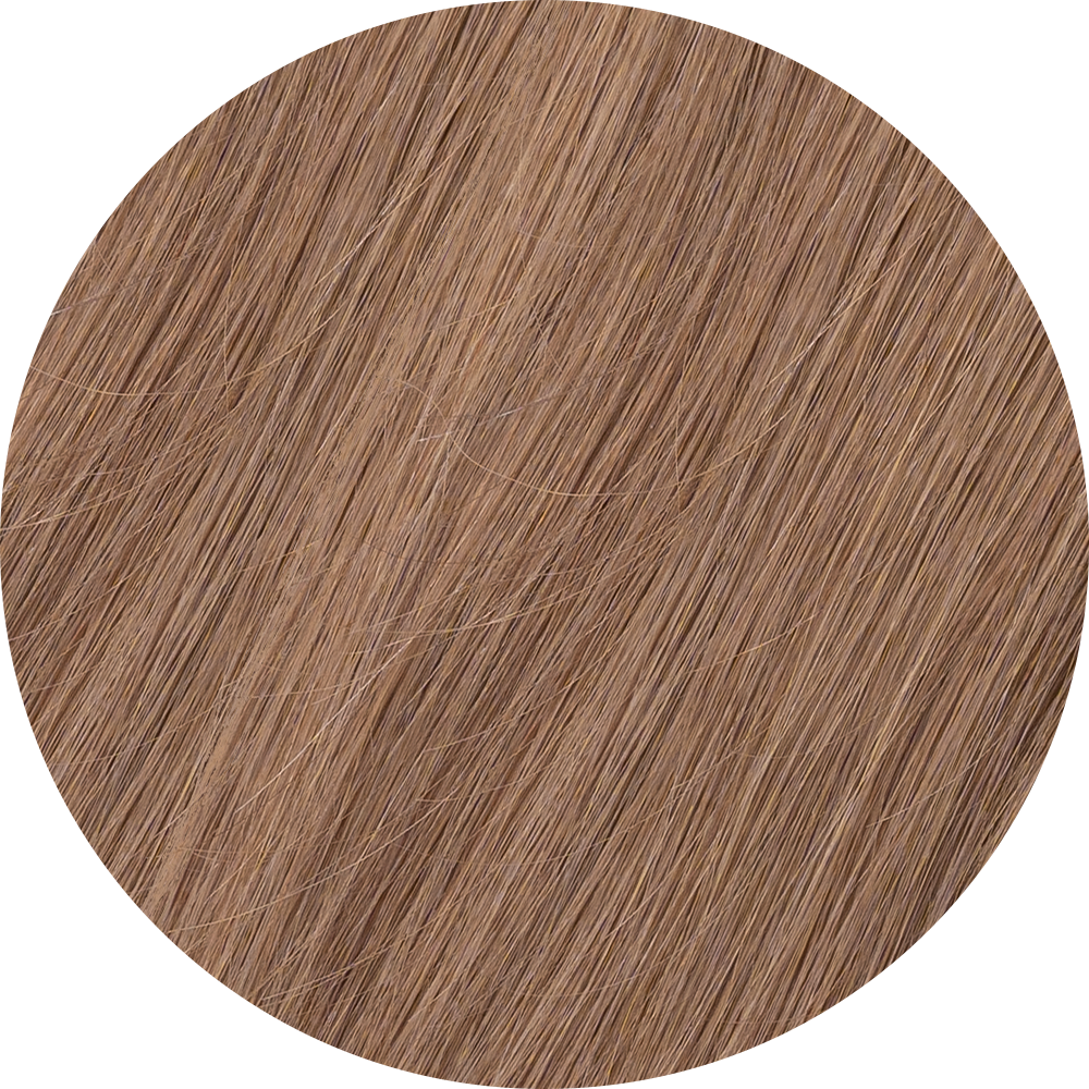 A close-up image of ash clip-in hair extensions showcasing the texture and color of the hair.   