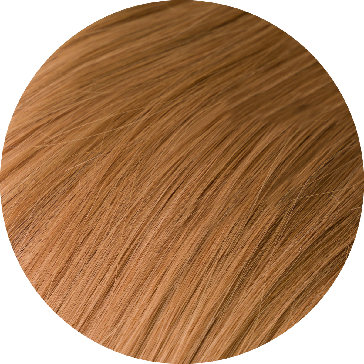 A close-up image of caramel clip-in hair extensions showcasing the texture and color of the hair.